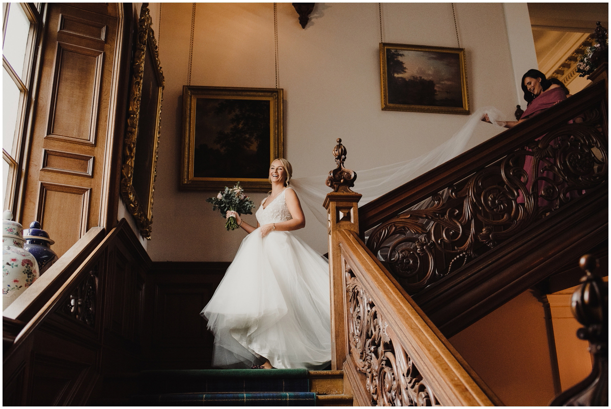 bride getting down the stairs