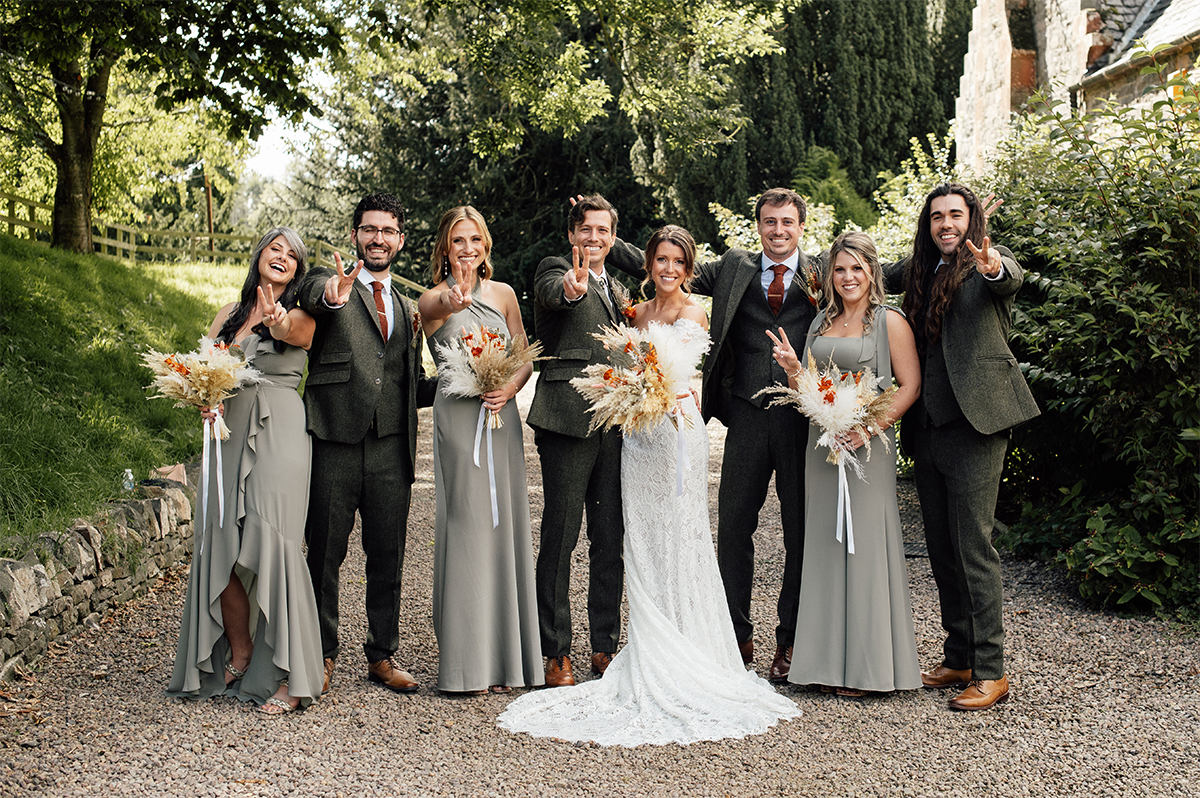 Bridal party posing for a funny photo.