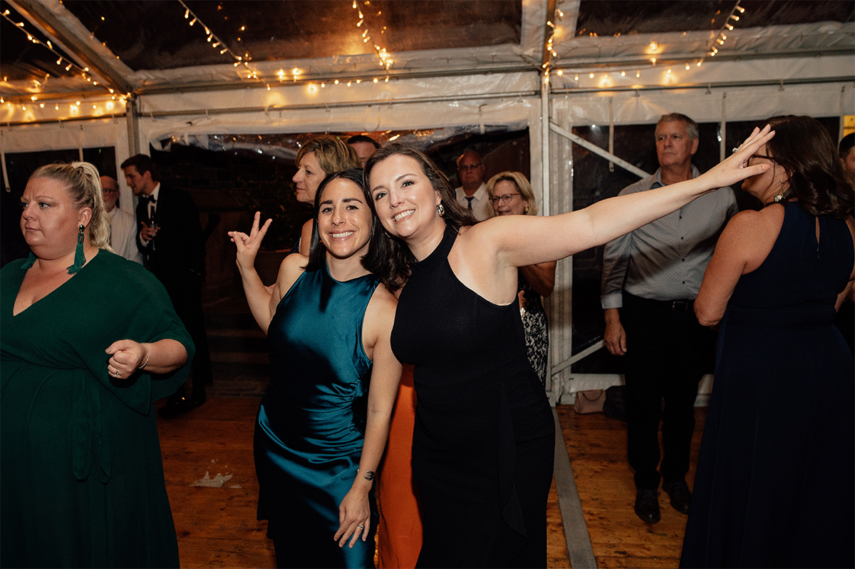 Wedding guests posing for a photo during dancing at the Thirlestane.