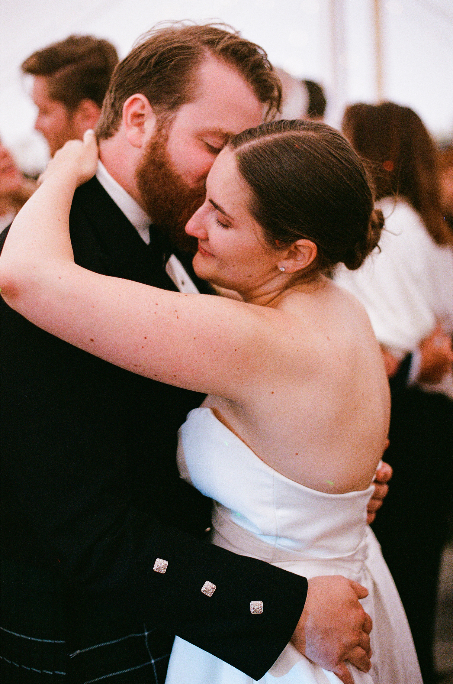 Bride and groom dancing together at Cambo Estate. 