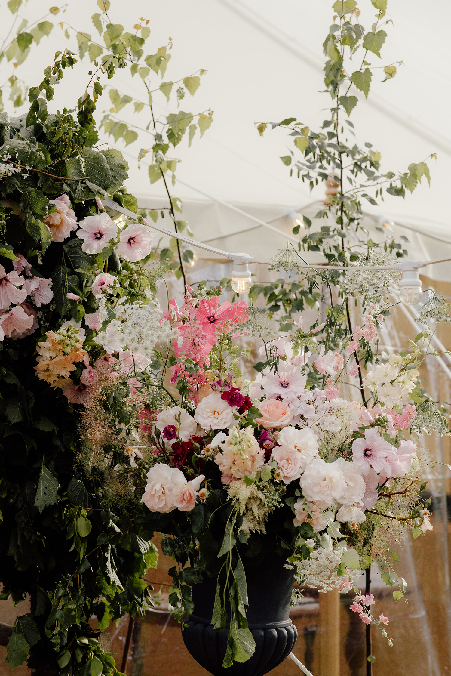 Marquee decorated with wedding flowers.